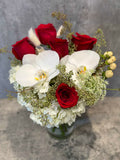 Red roses orchid in vase